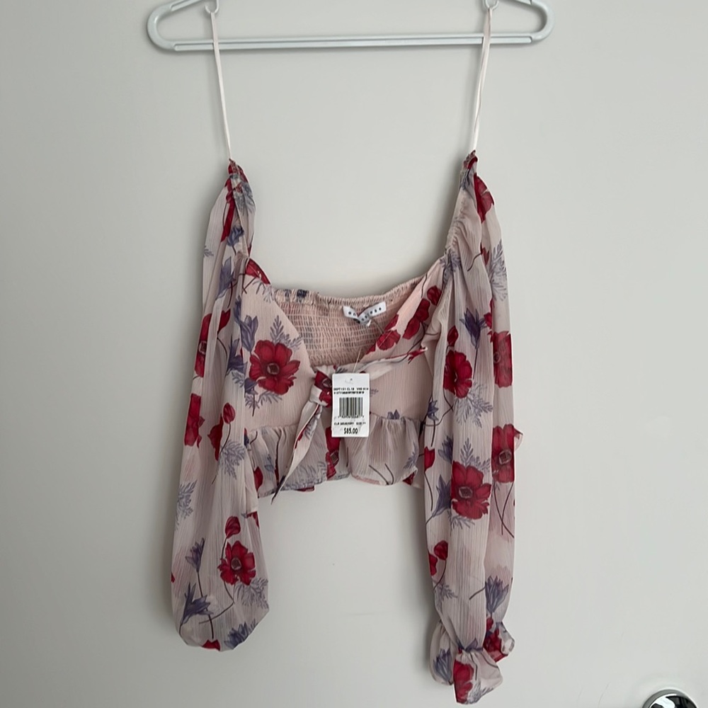 Endless rose XS crop top that ties in the front . Brand new with tags !